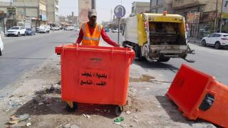 بلدية النجف تباشر بنشر حاويات النفايات ضمن قاطع القسم البلدي التاسع في حي العسكري